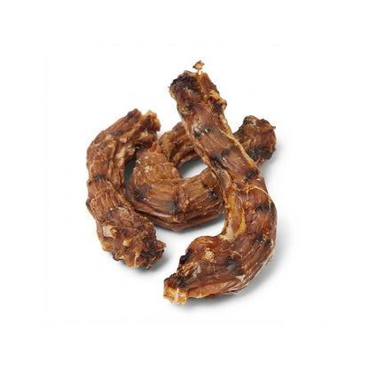 A small pile of dried chicken necks on a white background
