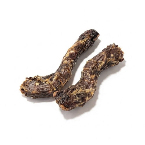 Two dried duck necks for dogs on a white background, showing their ridged texture
