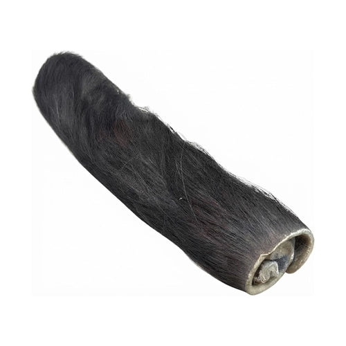 A furry buffalo wrap dog chew with the dark fur left on, on a white background
