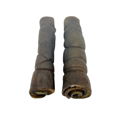 Two natural camel wrap dog chews on a white background