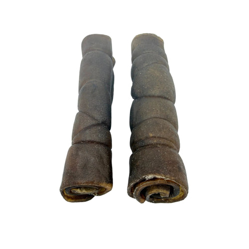 Two natural camel wrap dog chews on a white background