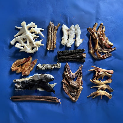The contents of the bag laid out on a blue background, with each type of treat grouped together