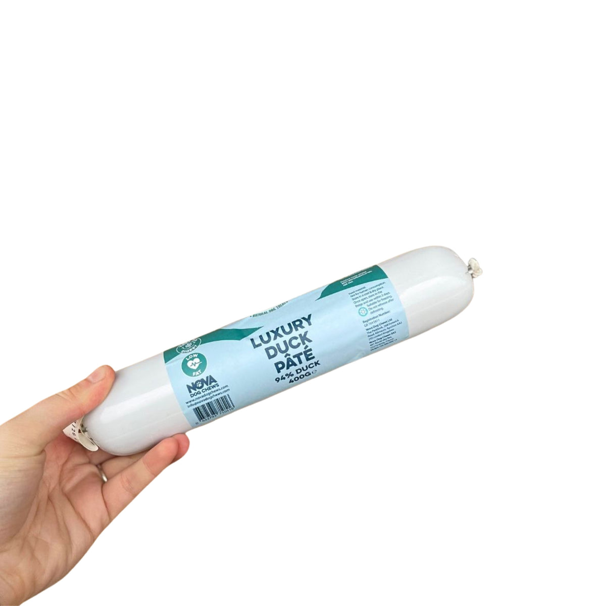 A 400g roll of duck pate for dogs held in a hand