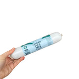 A 400g roll of duck pate for dogs held in a hand