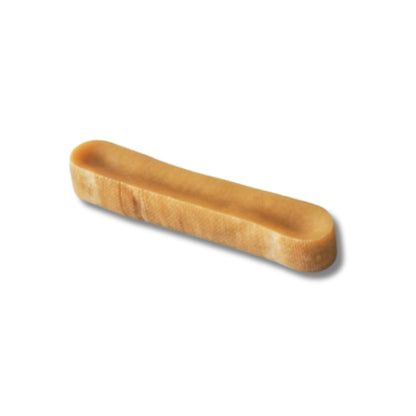 A single yak milk bar dog chew on a white background