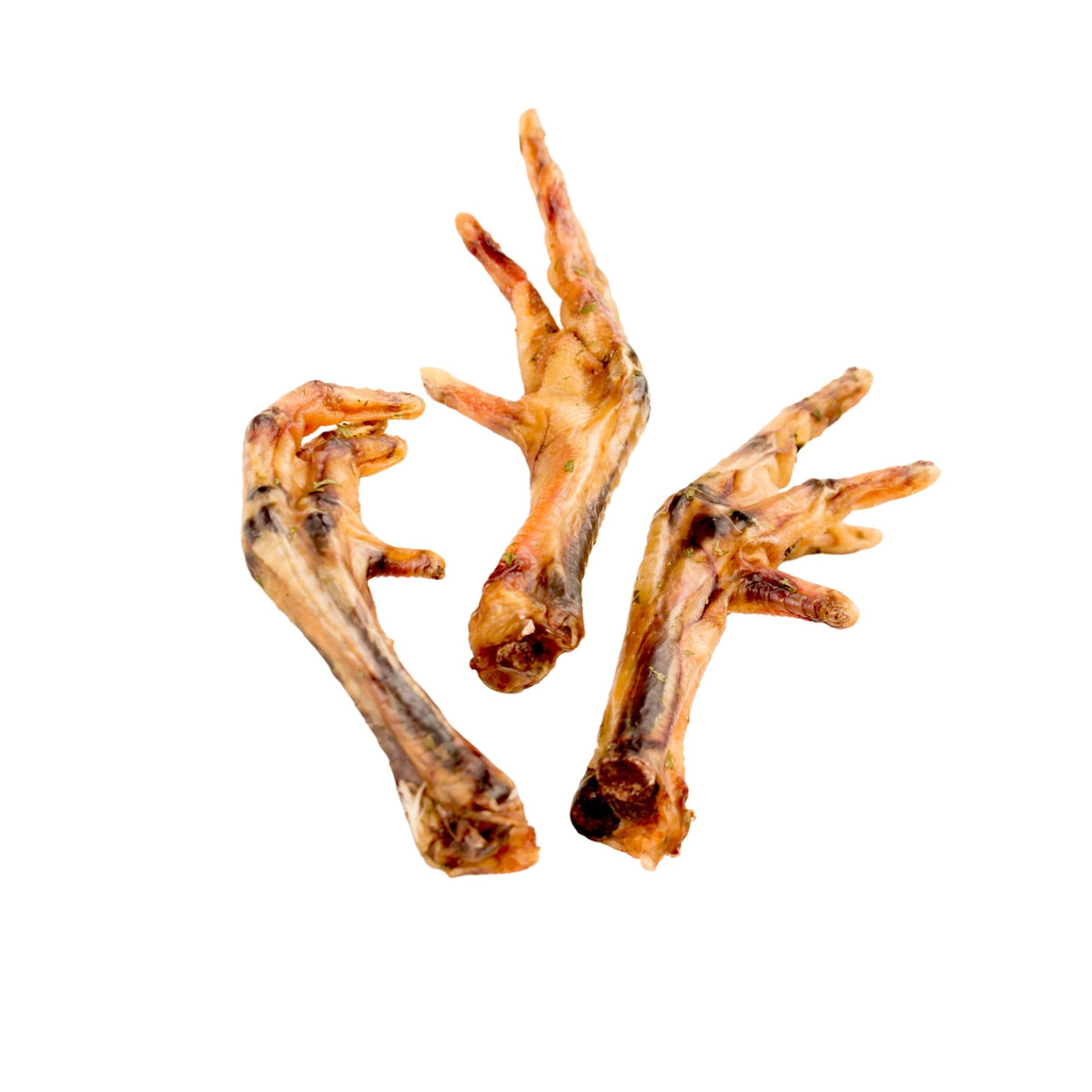 Three dried chicken feet dog treats on a white background